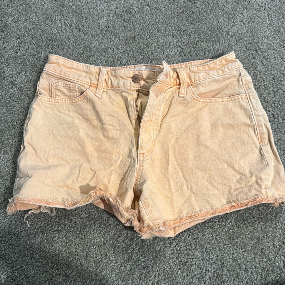 Washed orange mid rise shorts